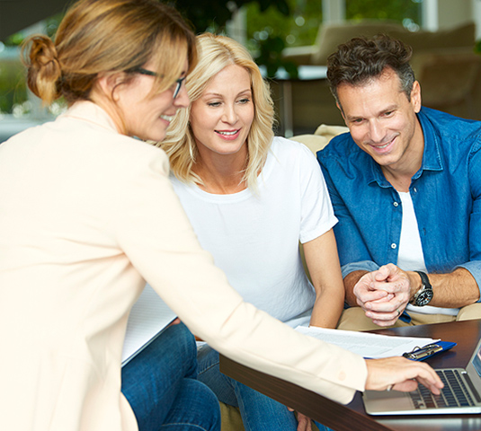 Agent walking home buyers through escrow, inspections and appraisals